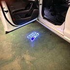 LUCES DE PROYECTOR LOGO AUDI No 120 (cantidad 1 = 2 películas con logotipo / 2 luces de puerta)