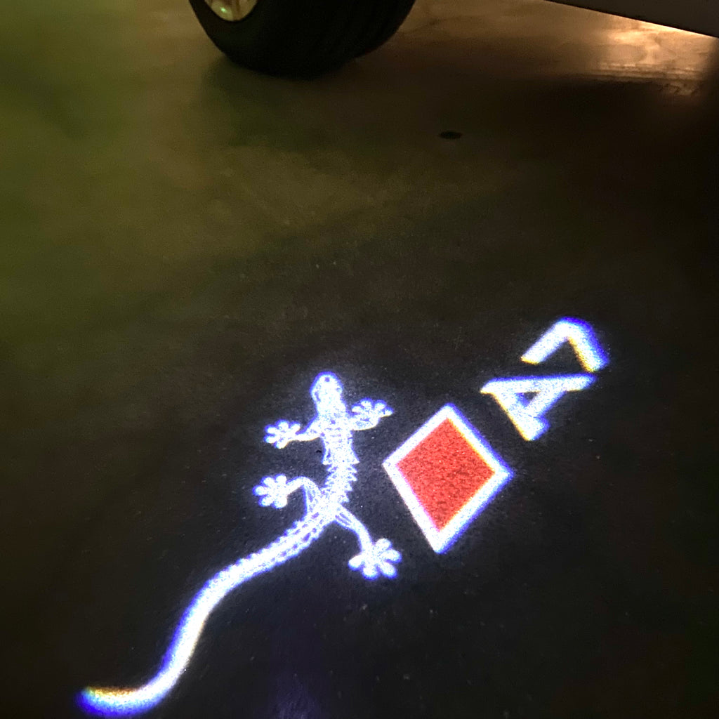 AUDI LOGO PROJECTOT LIGHTS Nr.120 (الكمية 1 = 2 Logo Films /2 أضواء الباب)