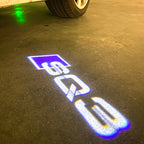 LUCES DE PROYECTOR LOGO AUDI No 120 (cantidad 1 = 2 películas con logotipo / 2 luces de puerta)