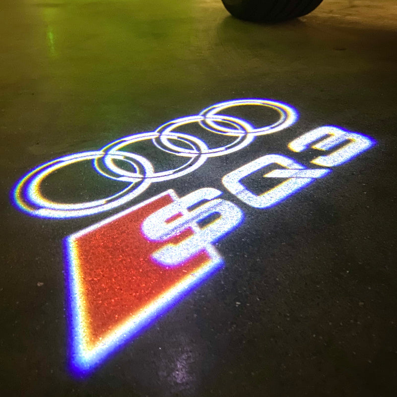 AUDI LOGO PROJECTOT LIGHTS Nr.120 (Menge 1 = 2 Logofolien /2 Türleuchten)