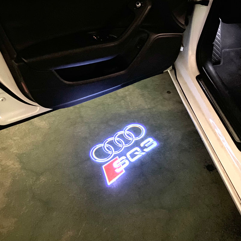 AUDI LOGO PROJECTOT LIGHTS Nr.120 (Menge 1 = 2 Logofolien /2 Türleuchten)