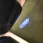 LUCES DE PROYECTOR LOGO AUDI No 120 (cantidad 1 = 2 películas con logotipo / 2 luces de puerta)