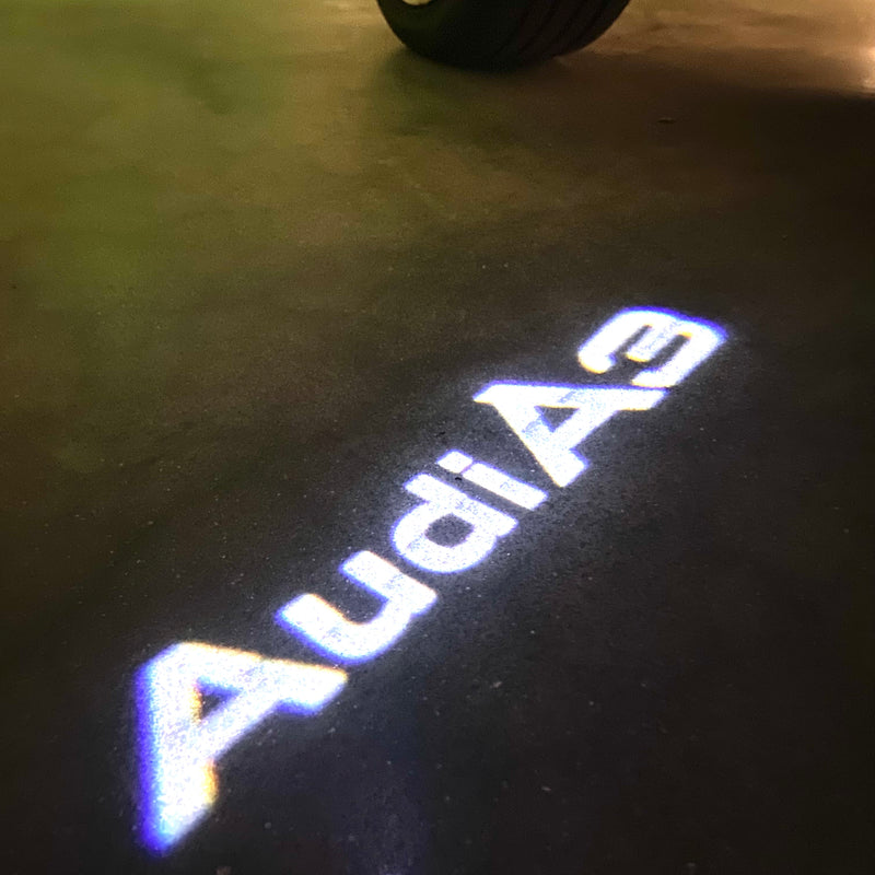 AUDI LOGO PROJECTOT LIGHTS Nr.120 (Menge 1 = 2 Logofolien /2 Türleuchten)