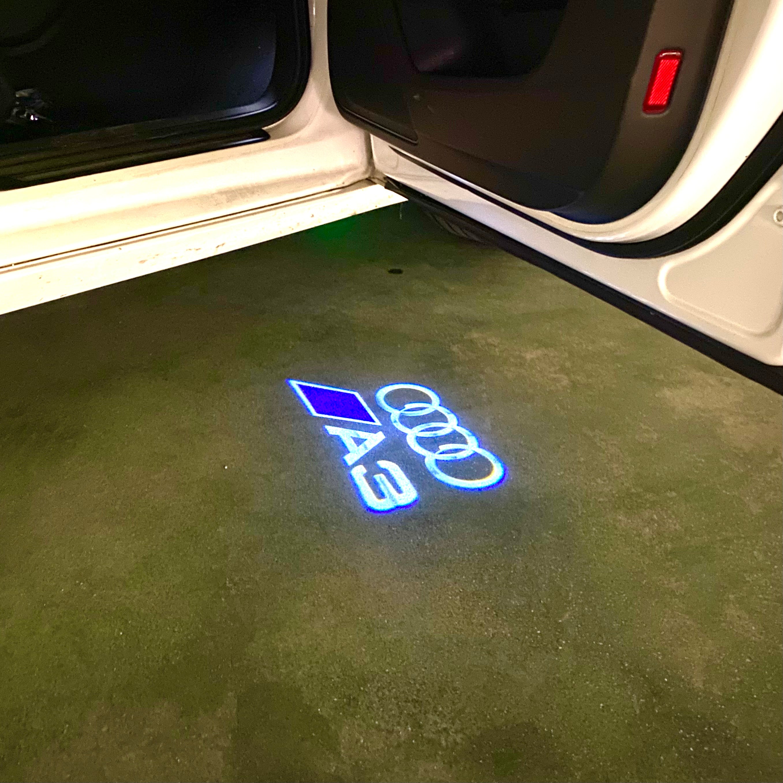 AUDI  A3 LOGO PROJECTOT LIGHTS  (quantity 1 = 2 Logo Films /2 door lights）Nr.12B104