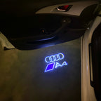 LUCES DE PROYECTOR LOGO AUDI No 120 (cantidad 1 = 2 películas con logotipo / 2 luces de puerta)