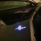 LUCES DE PROYECTOR LOGO AUDI No 120 (cantidad 1 = 2 películas con logotipo / 2 luces de puerta)