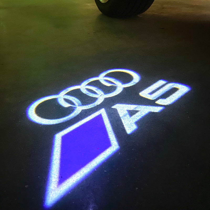 AUDI LOGO PROJECTOT LIGHTS Nr.120 (quantité 1 = 2 Logo Films /2 feux de porte)