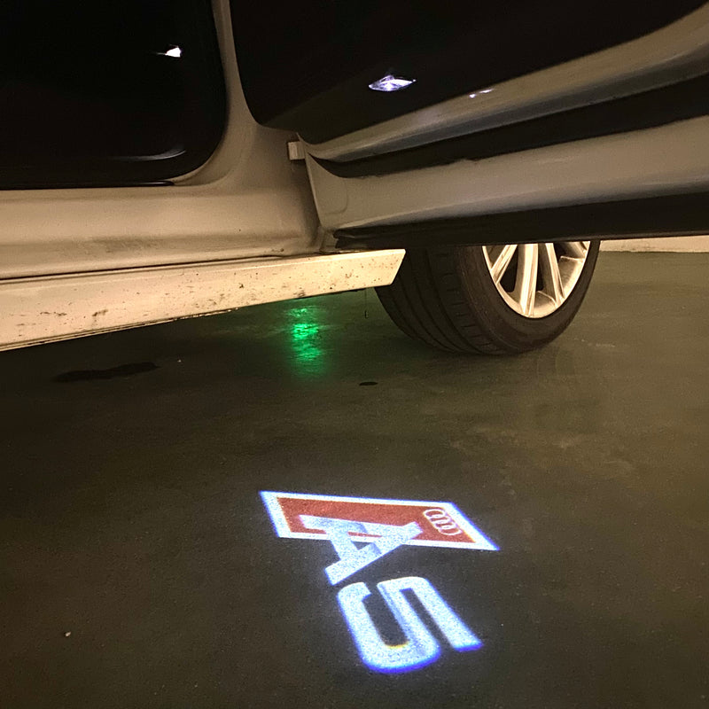 AUDI LOGO PROJECTOT LIGHTS Nr.120 (quantité 1 = 2 Logo Films /2 feux de porte)