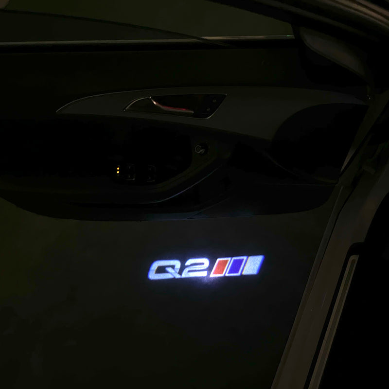 LUCES DE PROYECTOR LOGO AUDI No 120 (cantidad 1 = 2 películas con logotipo / 2 luces de puerta)