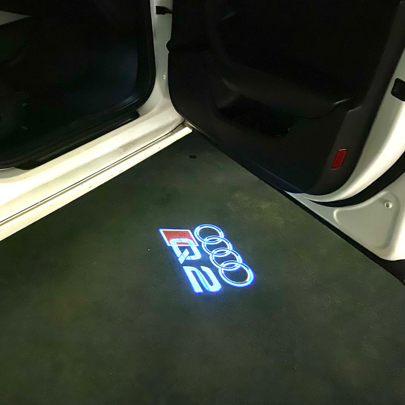 AUDI LOGO PROJECTOT LIGHTS Nr.120 (Menge 1 = 2 Logofolien /2 Türleuchten)