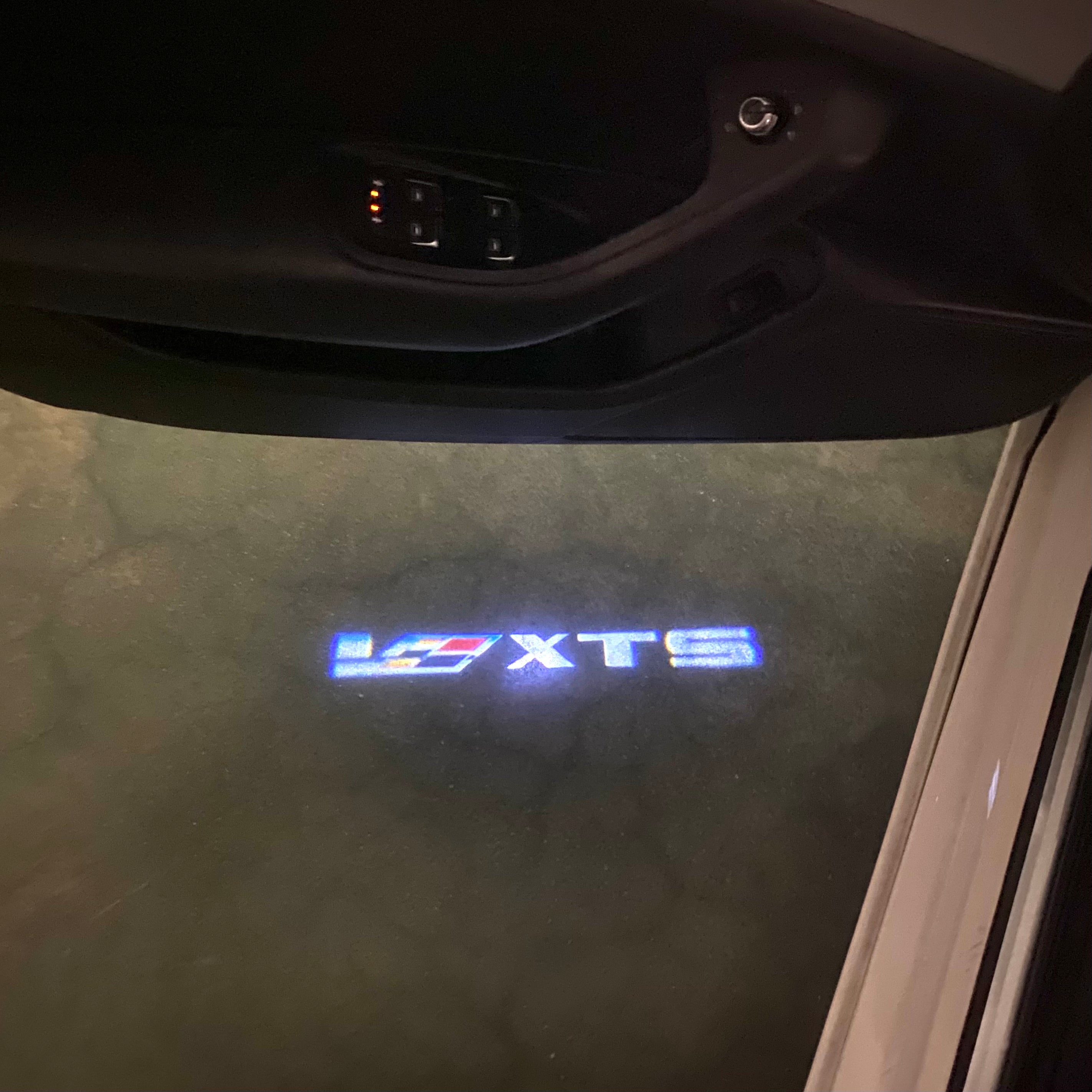 CADILLAC XTS LOGO PROJECTOT LIGHTS Nr.9802 (quantity 1 = 2 Logo Films /2 door lights）