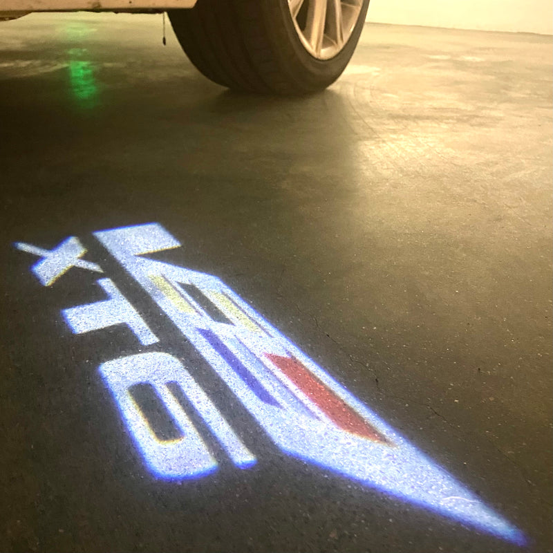 AUDI LOGO PROJECTOT LIGHTS Nr.19 (cantidad 1 = 2 películas con logotipo /2 luces de puerta)