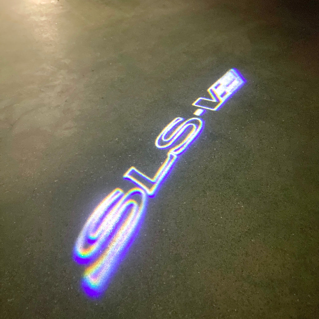 AUDI LOGO PROJECTOT LIGHTS Nr.19 (الكمية 1 = 2 Logo Films /2 أضواء الباب)