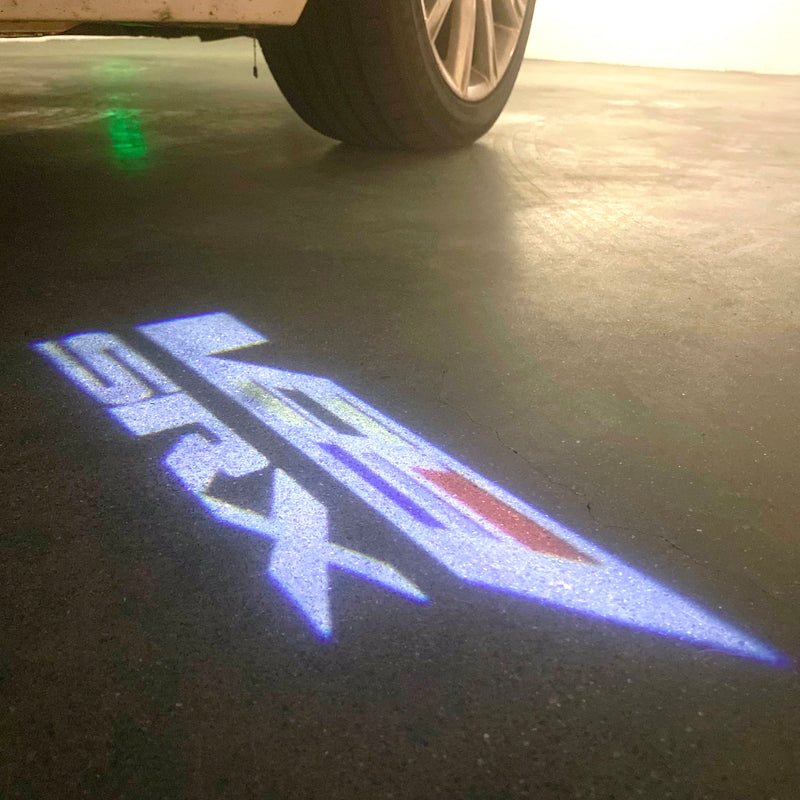 AUDI LOGO PROJECTOT LIGHTS Nr.19 (cantidad 1 = 2 películas con logotipo /2 luces de puerta)