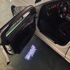 LUCES DE PROYECTOR LOGO AUDI No 120 (cantidad 1 = 2 películas con logotipo / 2 luces de puerta)