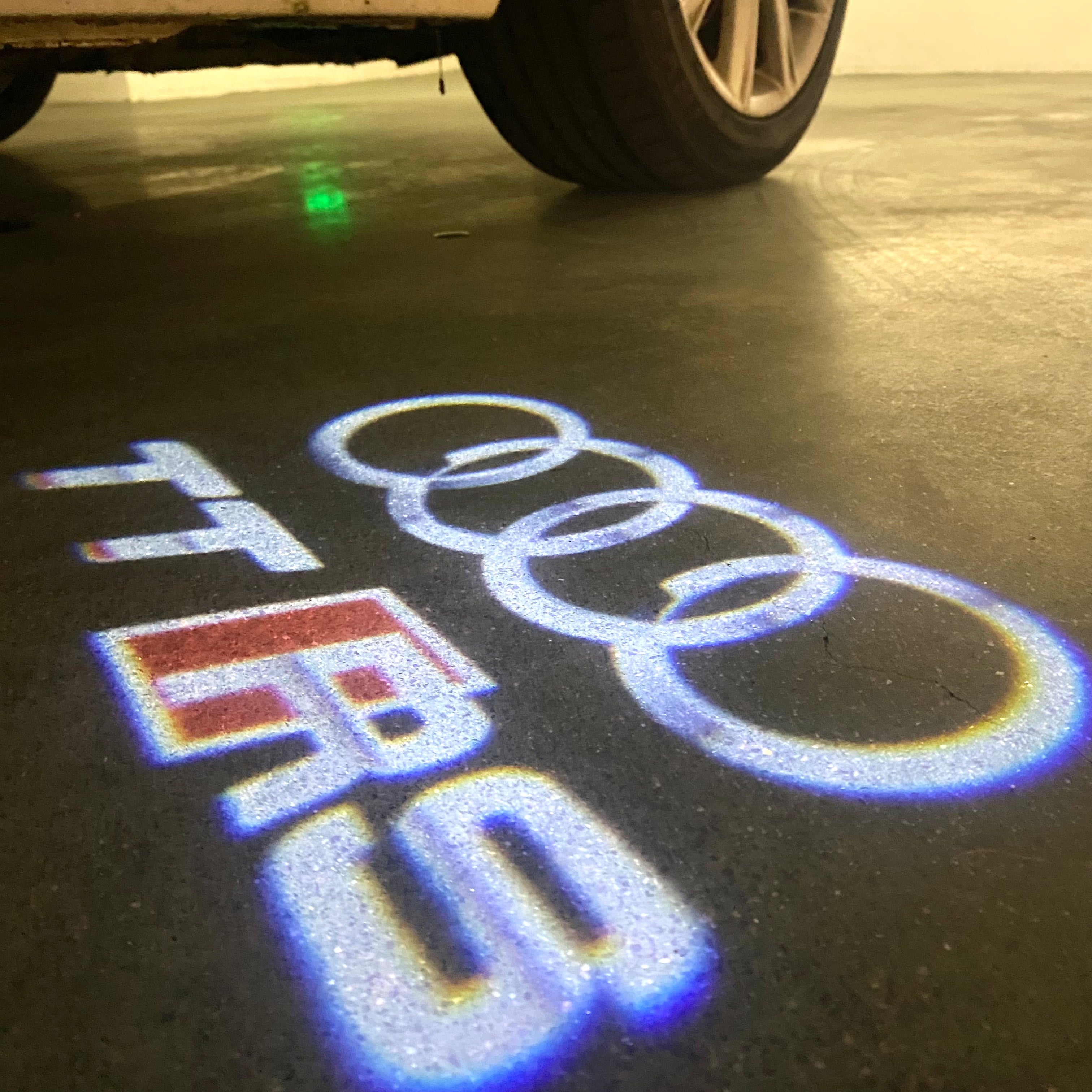 AUDI  TTRS LOGO PROJECTOT LIGHTS  (quantity 1 = 2 Logo Films /2 door lights）Nr.12B50