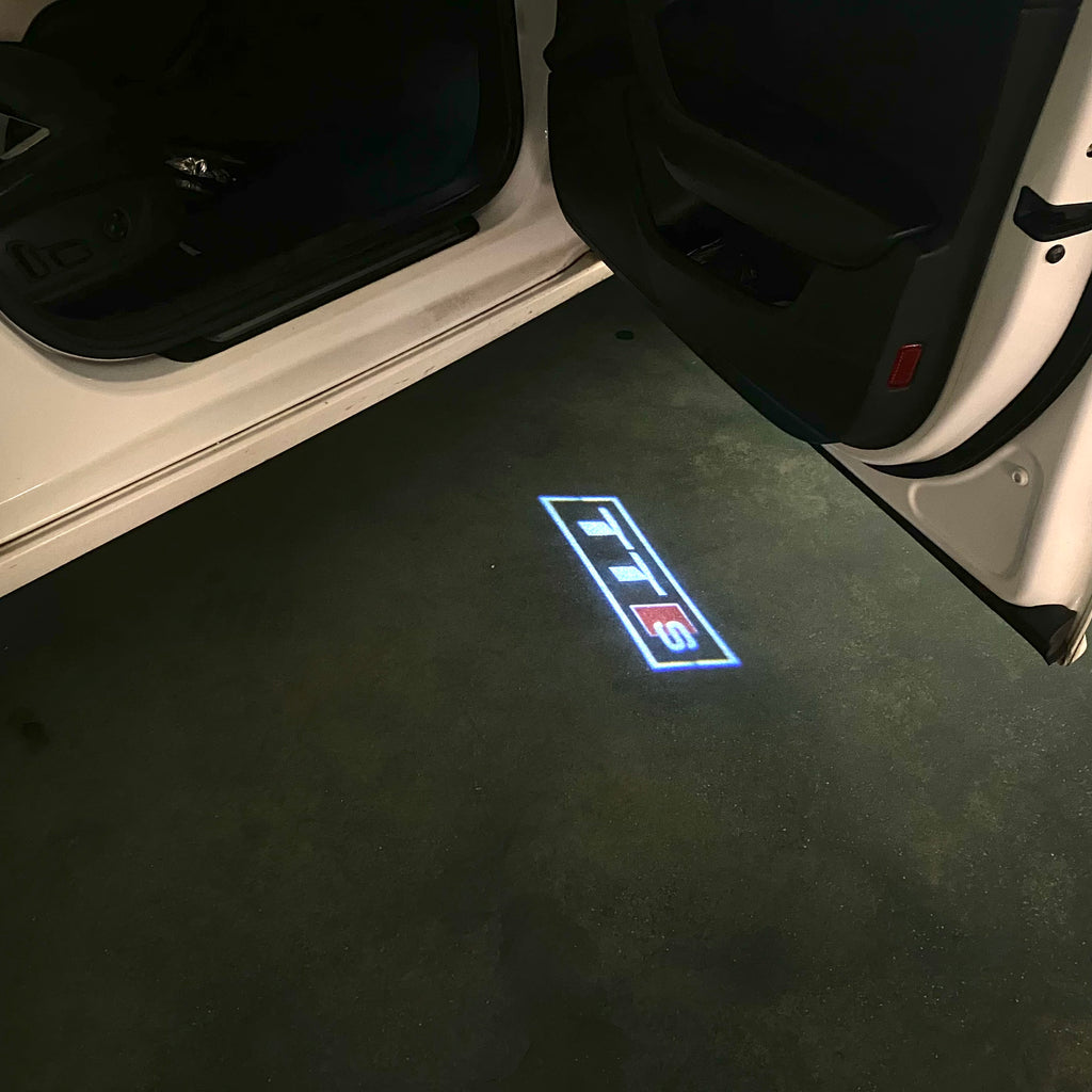 AUDI LOGO PROJECTOT LIGHTS Nr.120 (الكمية 1 = 2 Logo Films /2 أضواء الباب)