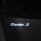 LUCI PROIETTORI LOGO ORIGINALI PORSCHE Nr.03 (quantità 1 = 2 Logo Film / 2 luci porta)