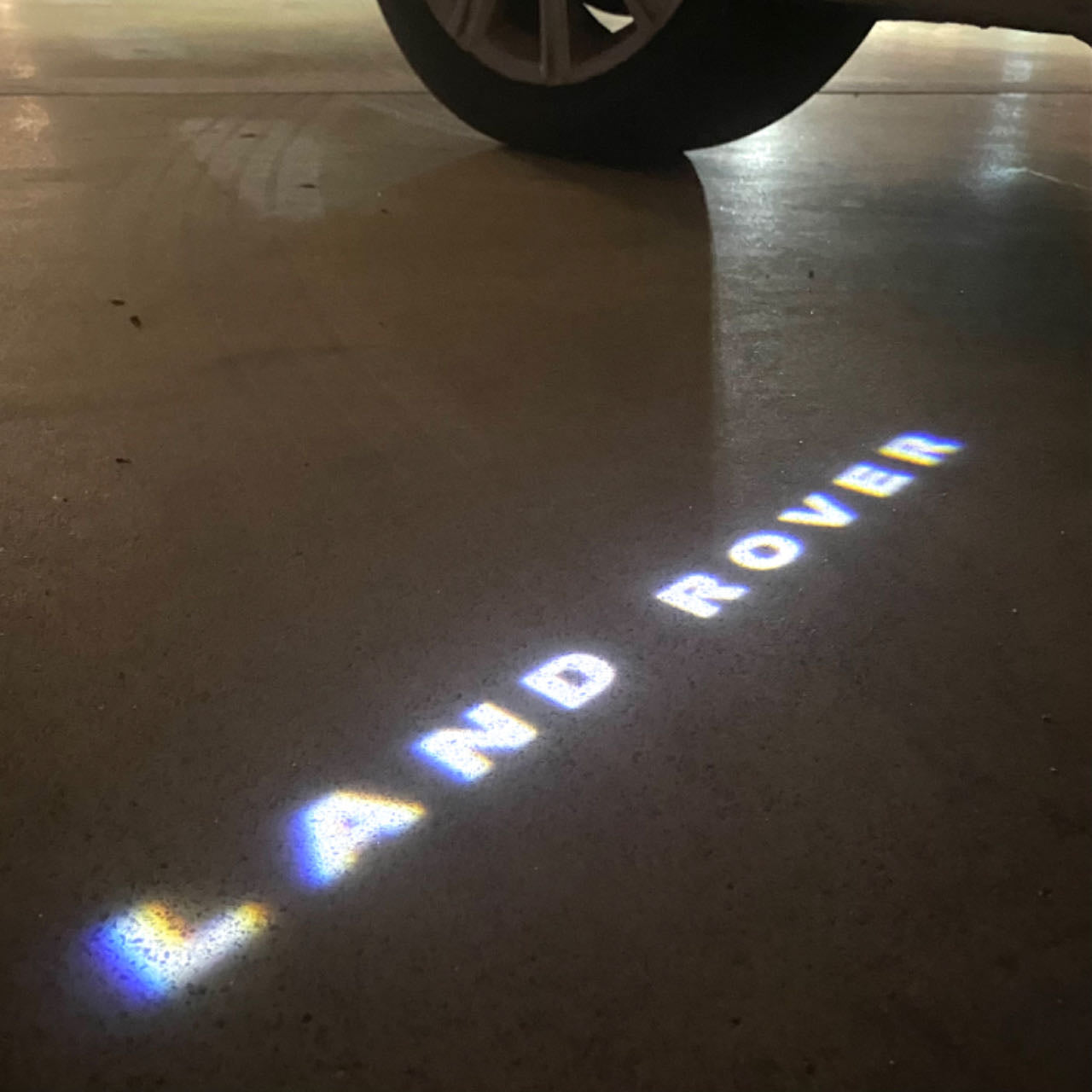 LUCI PROIETTORI LOGO Land Rover Nr.04 (quantità 1 = 1 set / 2 luci porta)