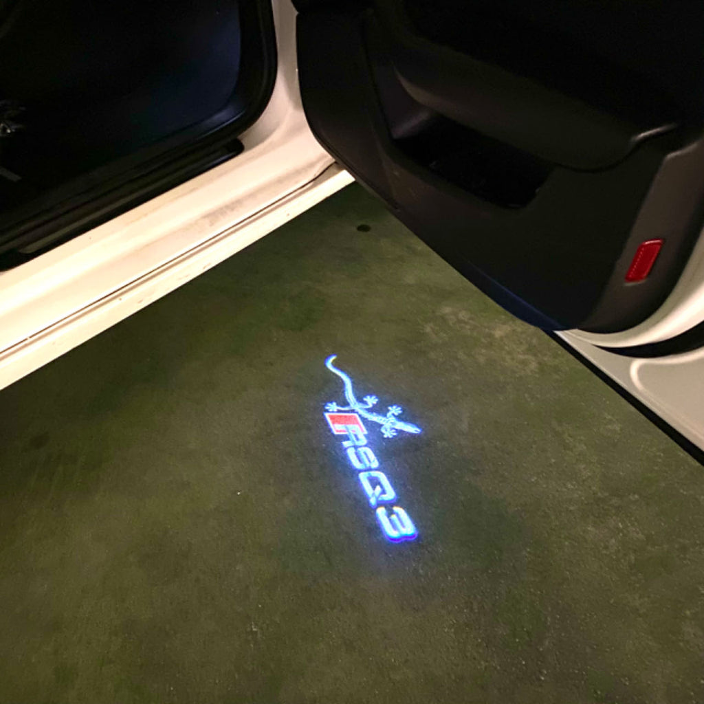 AUDI LOGO PROJECTOT LIGHTS Nr.120 (Menge 1 = 2 Logofolien /2 Türleuchten)