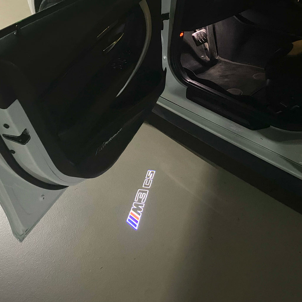 ÉCLAIRAGE DE PROJECTEUR BMW M3 LOGO Nr.24 (quantité 1 = 1 jeux / 2 feux de porte)