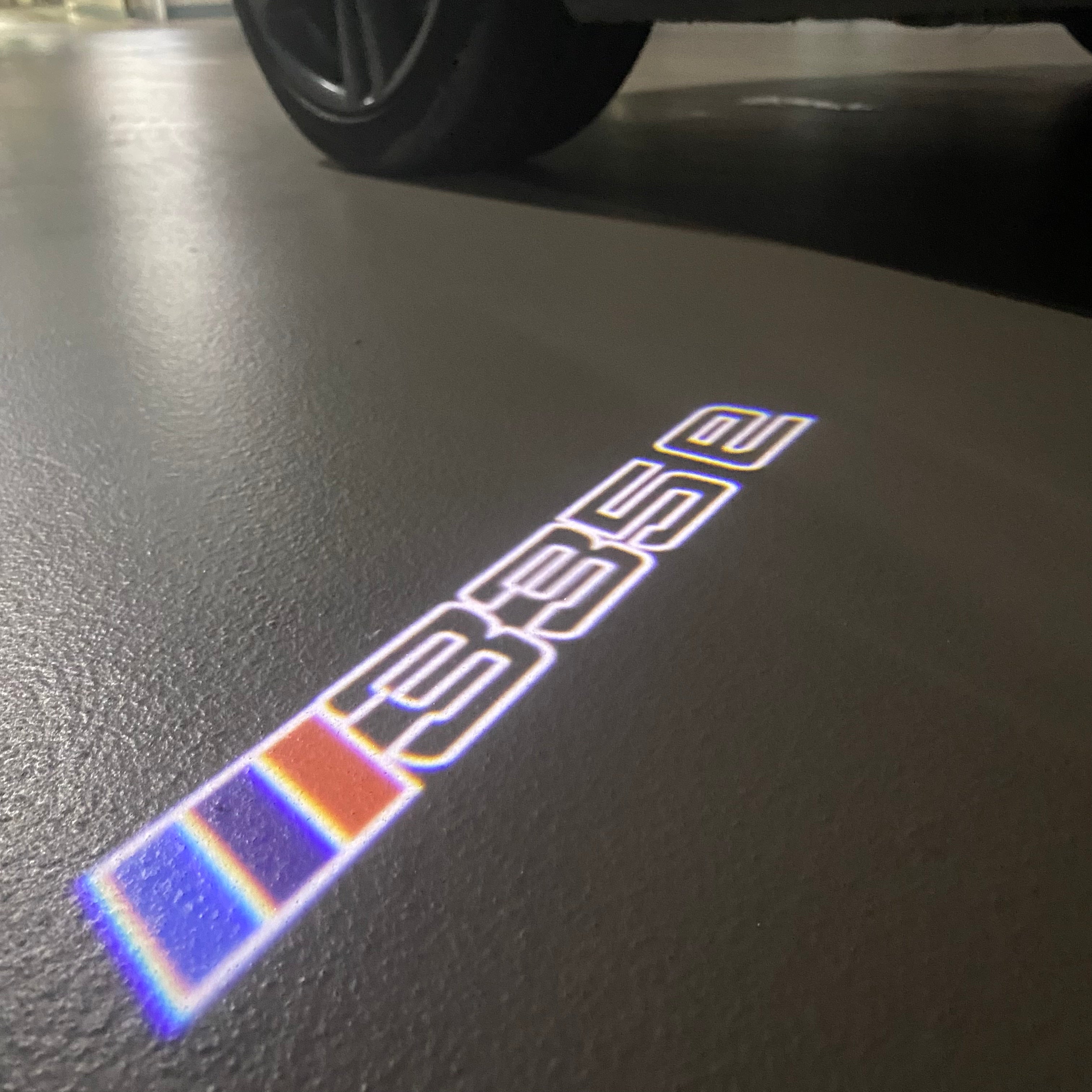 BMW 3 SERIES 335e  LOGO PROJECTOT LIGHTS (quantity 1 = 1 sets/2 door lights) Nr.6024q302