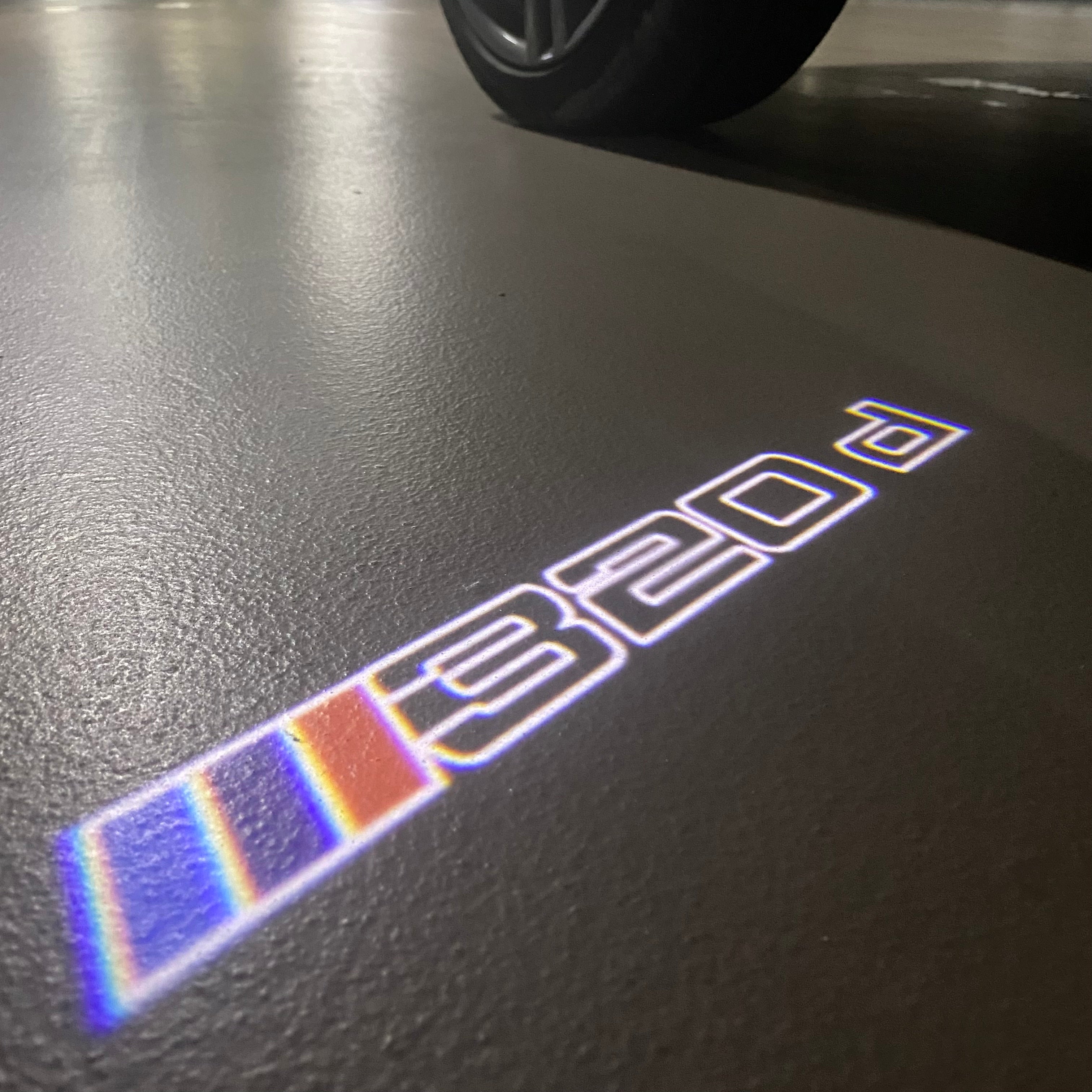 BMW 3 SERIES 320 d  LOGO PROJECTOT LIGHTS (quantity 1 = 1 sets/2 door lights) Nr.6024q50