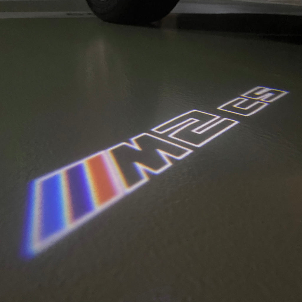 ÉCLAIRAGE DE PROJECTEUR BMW M3 LOGO Nr.24 (quantité 1 = 1 jeux / 2 feux de porte)