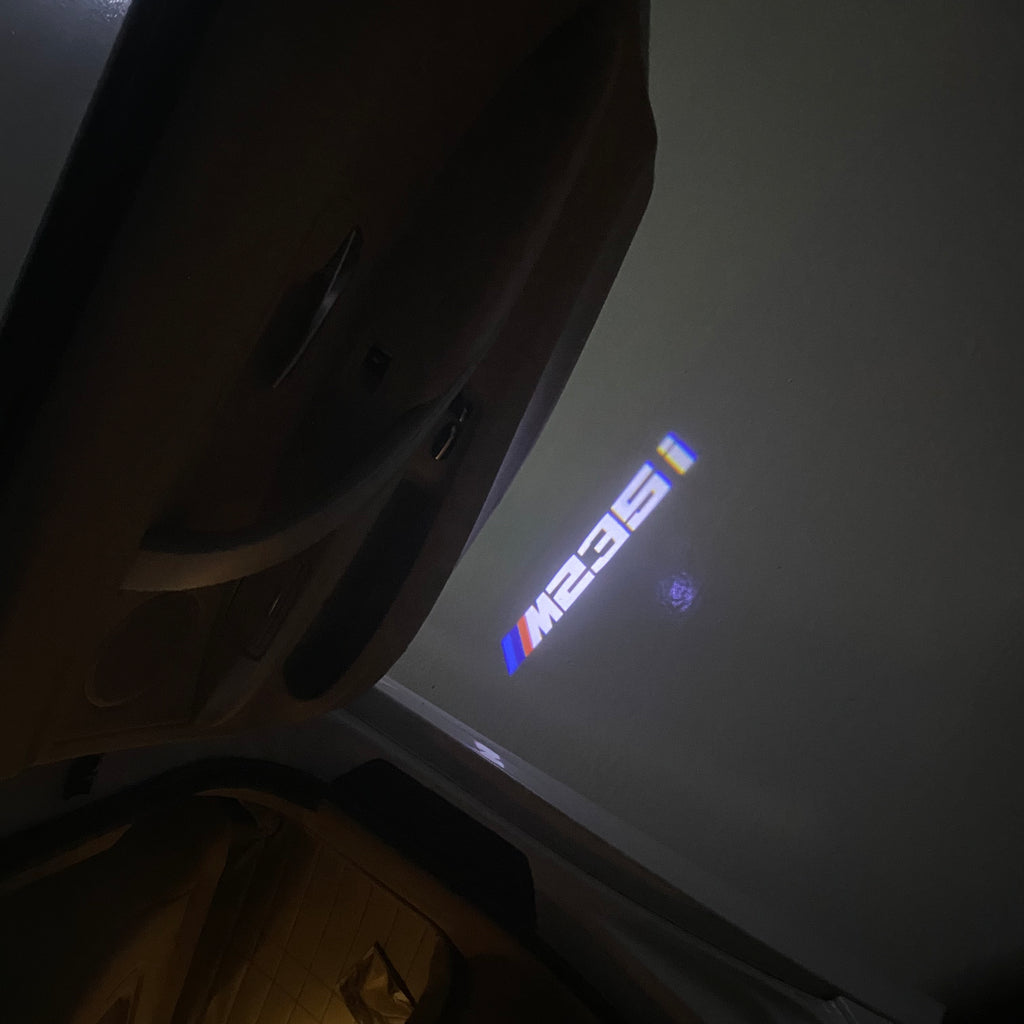 ÉCLAIRAGE DE PROJECTEUR BMW M3 LOGO Nr.24 (quantité 1 = 1 jeux / 2 feux de porte)