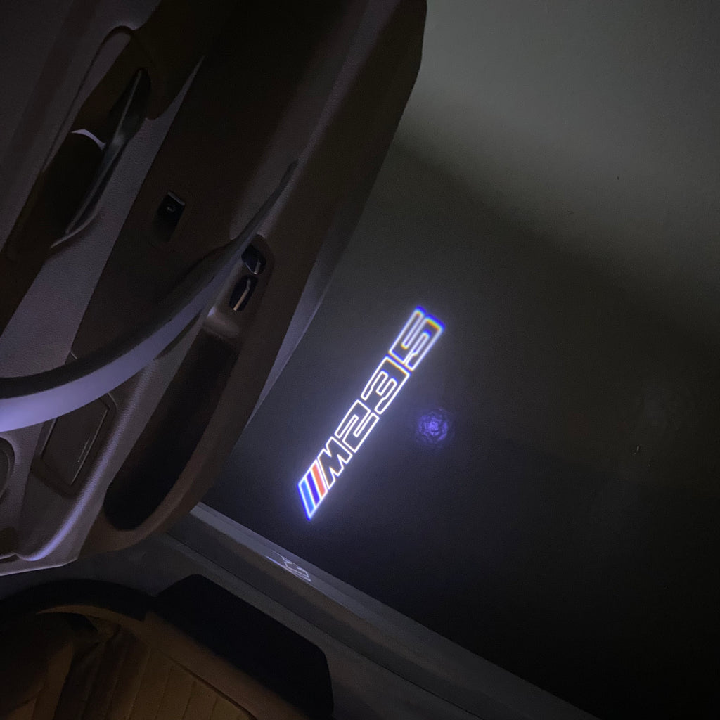 ÉCLAIRAGE DE PROJECTEUR BMW M3 LOGO Nr.24 (quantité 1 = 1 jeux / 2 feux de porte)