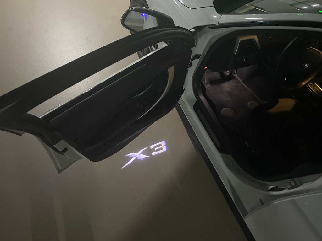 BMW X3  LOGO PROJECTOT LIGHTS (quantity 1 = 1 sets/2 door lights) Nr.6024q0t16