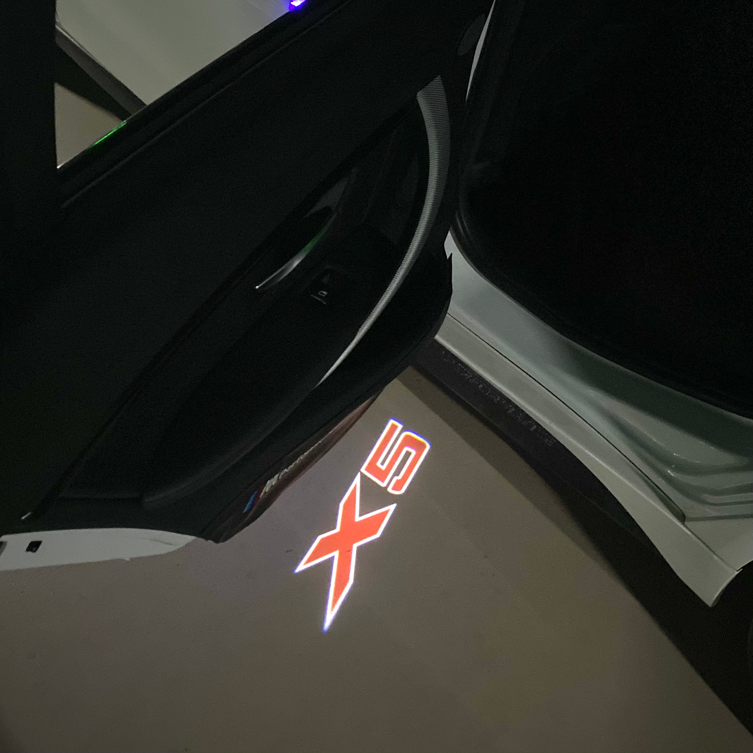 BMW X5   LOGO PROJECTOT LIGHTS (quantity 1 = 1 sets/2 door lights) Nr.6024q0t048