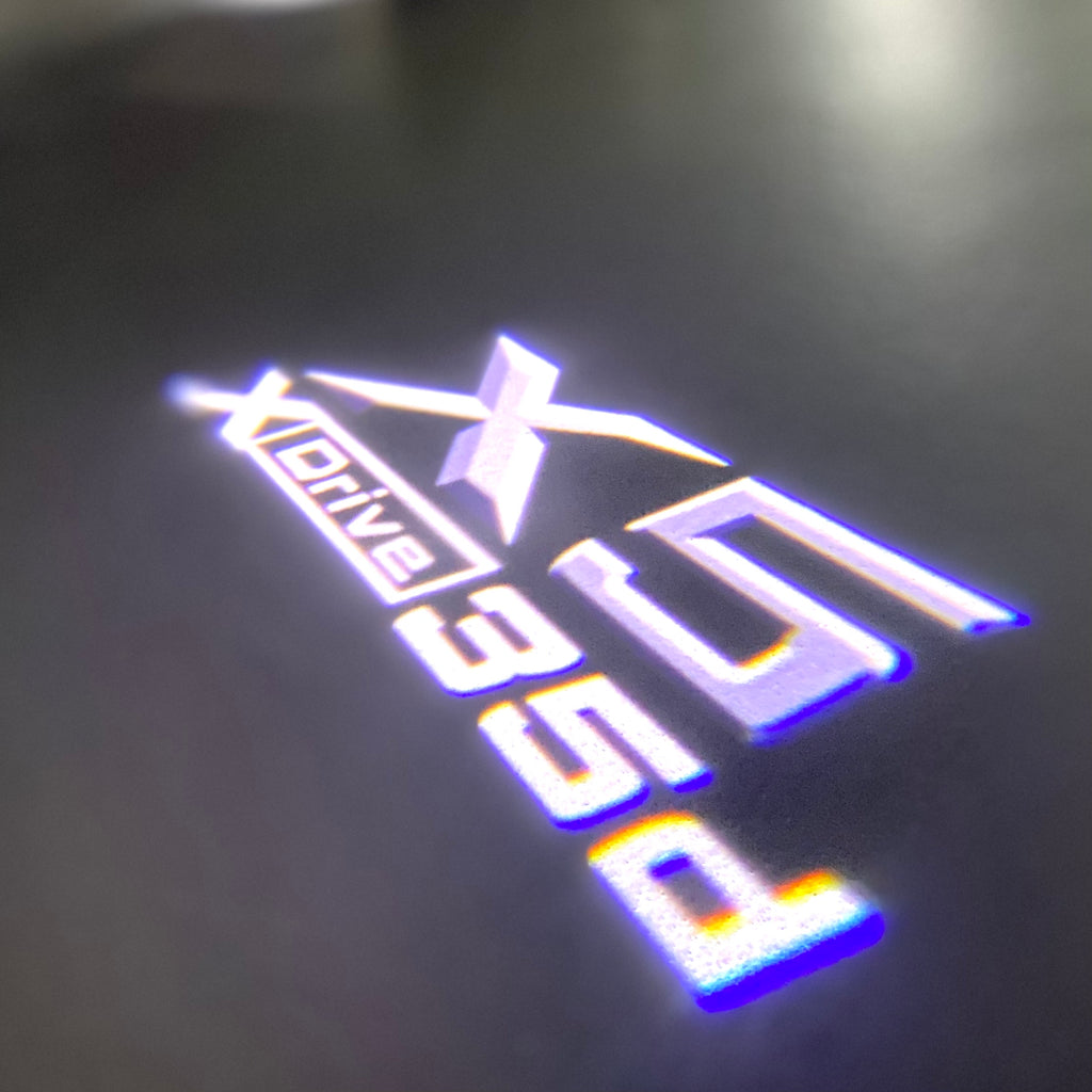 BMW X5 XDrive 35d  LOGO PROJECTOT LIGHTS (quantity 1 = 1 sets/2 door lights) Nr.6024q0t066