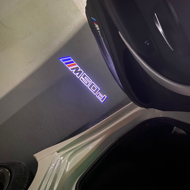 ÉCLAIRAGE DE PROJECTEUR BMW M3 LOGO Nr.24 (quantité 1 = 1 jeux / 2 feux de porte)