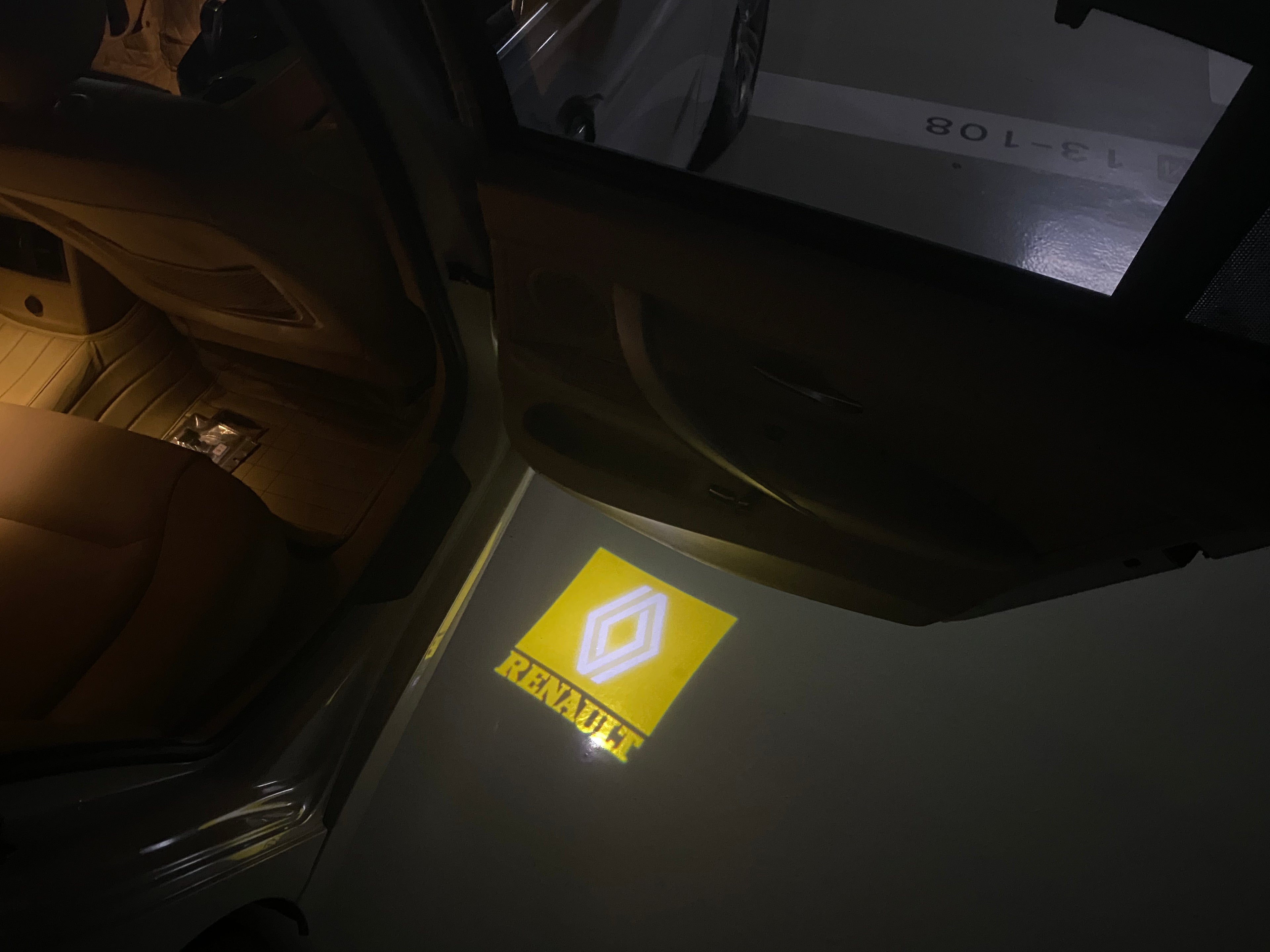 RENAULT ORIGINAL LOGO PROJECROTR LIGHTS Nr.0958 (quantity  1 =  2 Logo Film & 2 door lights)