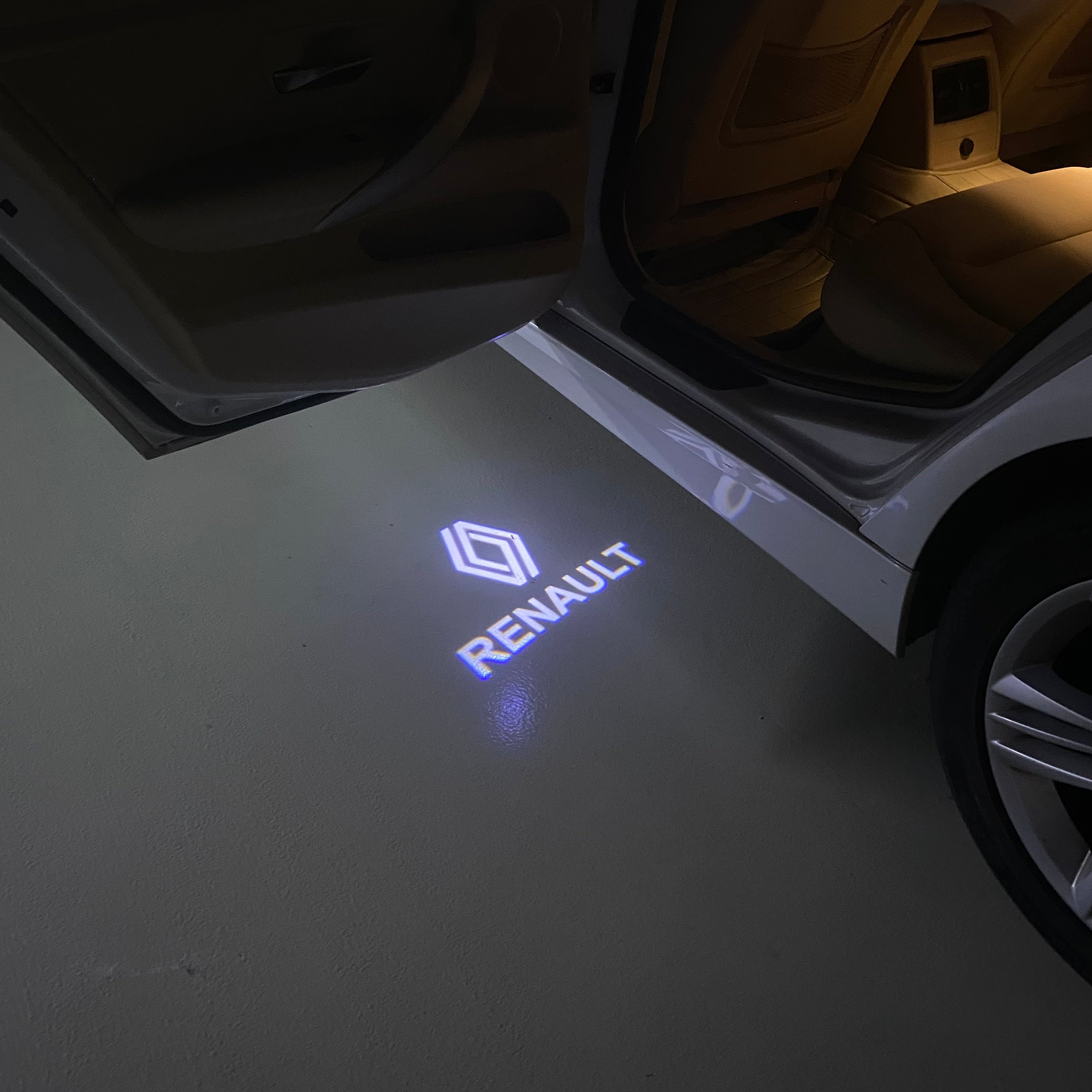 RENAULT ORIGINAL LOGO PROJECROTR LIGHTS Nr.0963 (quantity  1 =  2 Logo Film & 2 door lights)