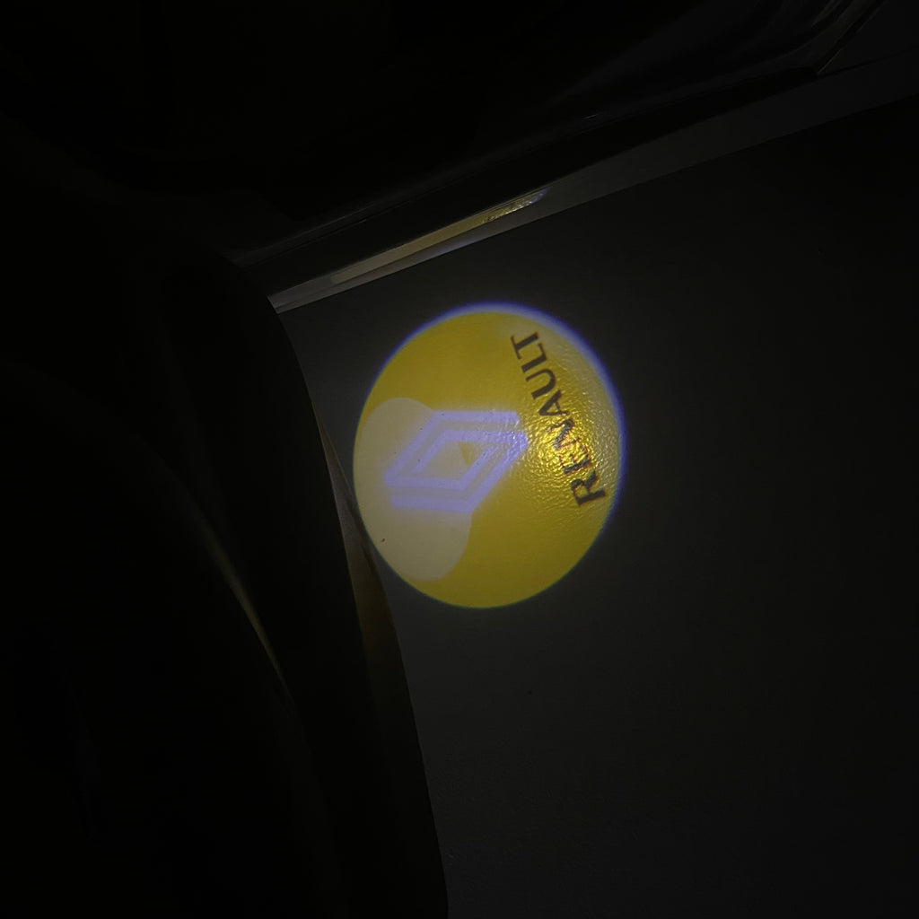 RENAULT ORIGINAL LOGO PROJECROTR LIGHTS Nr.0946 (quantity  1 =  2 Logo Film & 2 door lights)