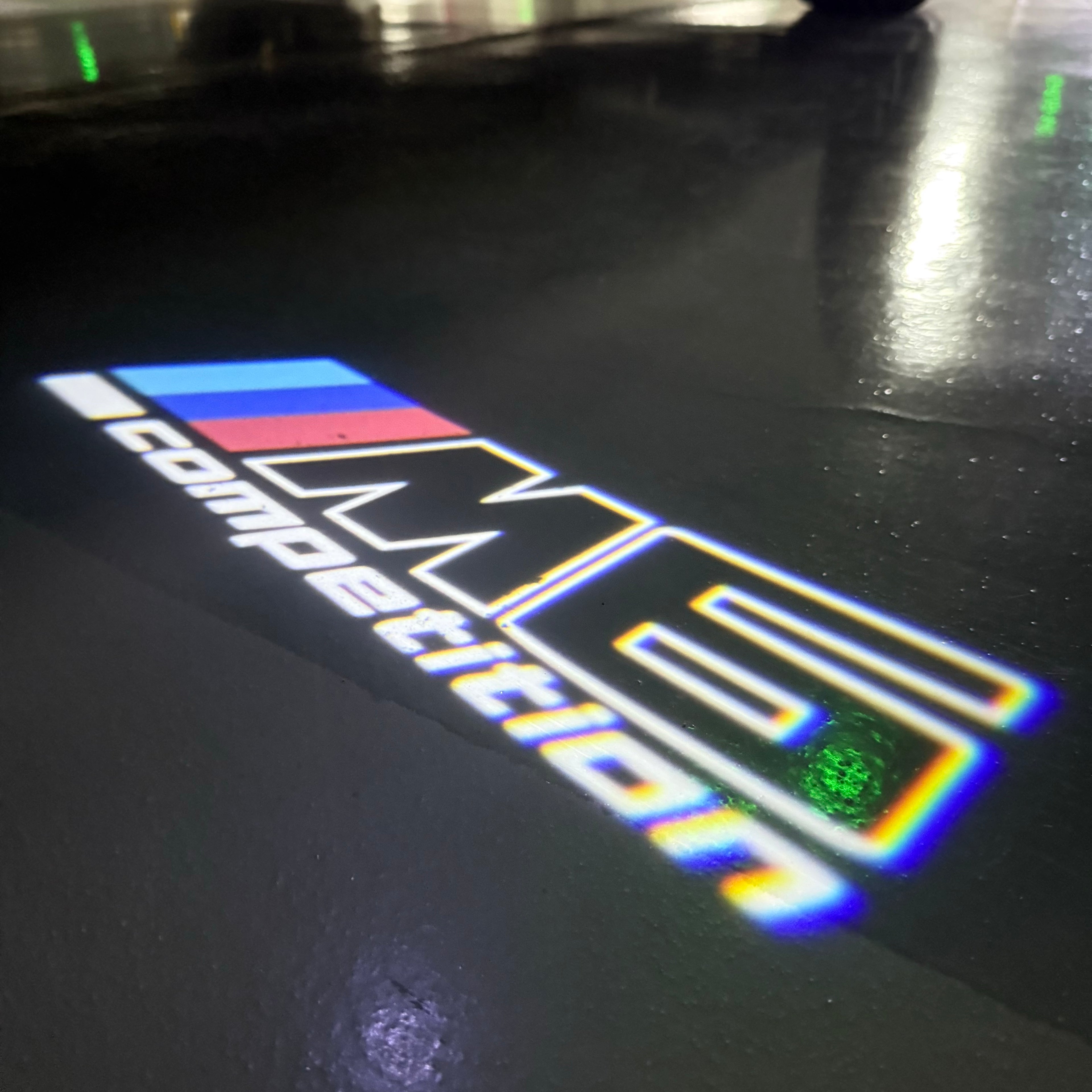 BMW 6 SERIES M6   LOGO PROJECTOT LIGHTS (quantity 1 = 1 sets/2 door lights) Nr.6024q115