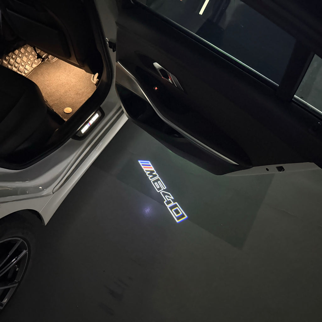 LUCES DE PROYECTOR DEL LOGOTIPO BMW M3 Nr.24 (cantidad 1 = 1 juegos / 2 luces de puerta)