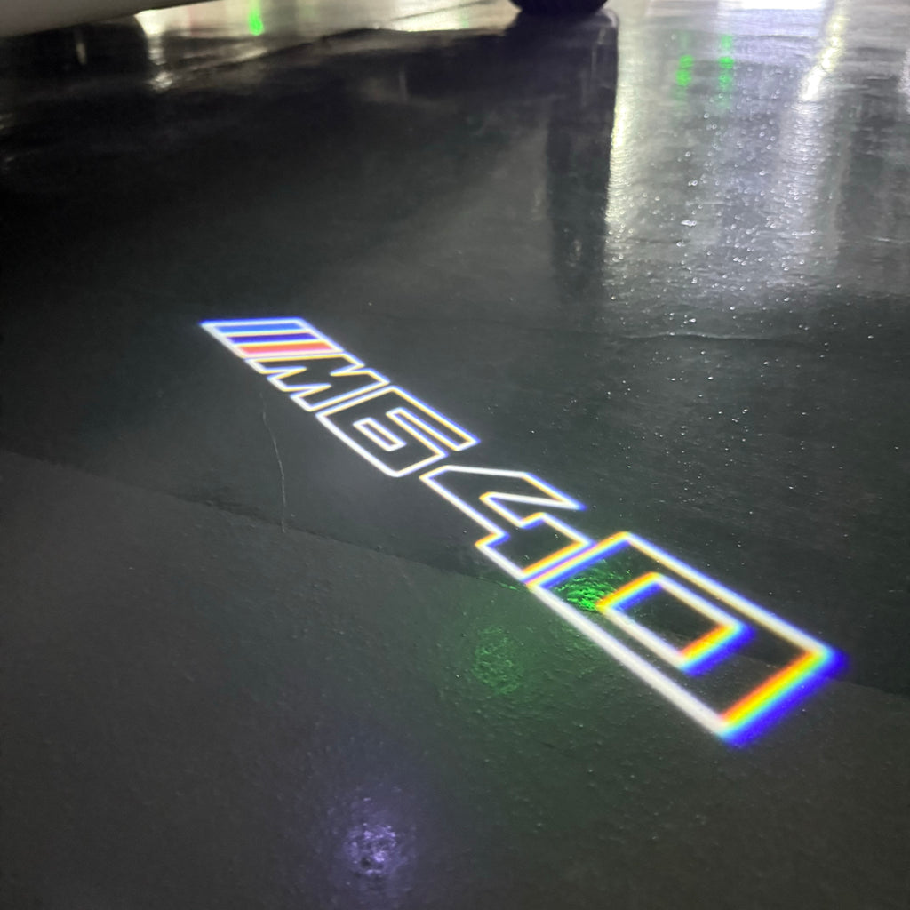 LUCES DE PROYECTOR DEL LOGOTIPO BMW M3 Nr.24 (cantidad 1 = 1 juegos / 2 luces de puerta)