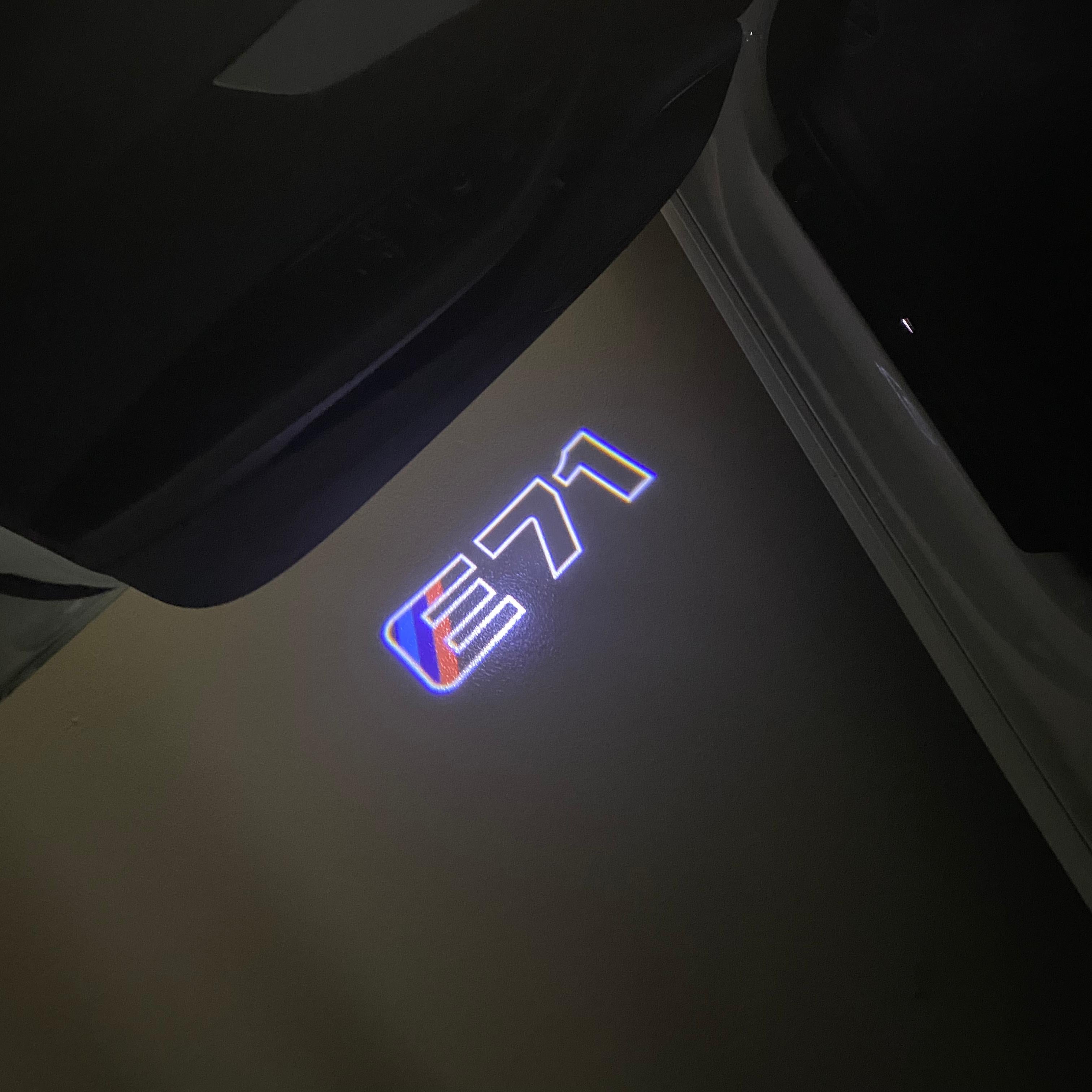 BMW X6 / X6M E71  LOGO PROJECTOT LIGHTS (quantity 1 = 1 sets/2 door lights) Nr.6024q0t0101