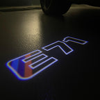 BMW X6 / X6M E71  LOGO PROJECTOT LIGHTS (quantity 1 = 1 sets/2 door lights) Nr.6024q0t0101