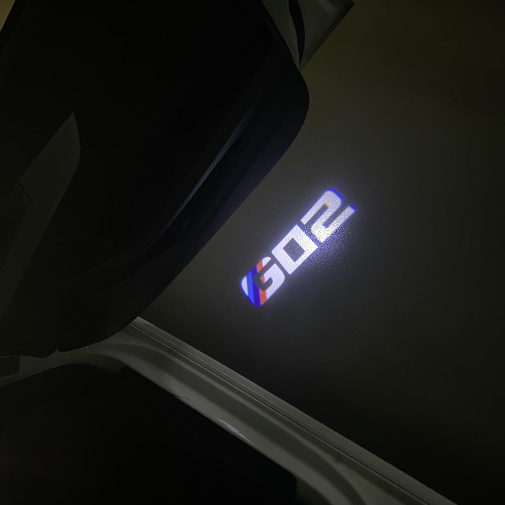 BMW X4 / X4M G02  LOGO PROJECTOT LIGHTS (quantity 1 = 1 sets/2 door lights) Nr.6024q0t034