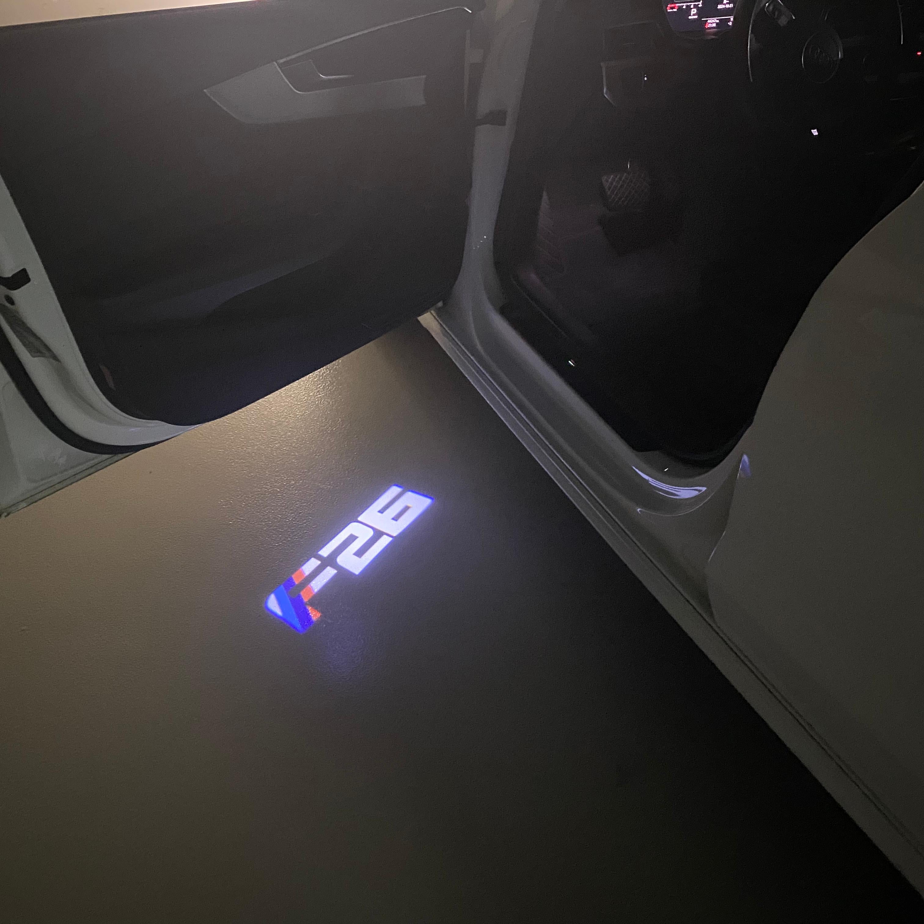 BMW X4 / X4M F26  LOGO PROJECTOT LIGHTS (quantity 1 = 1 sets/2 door lights) Nr.6024q0t043