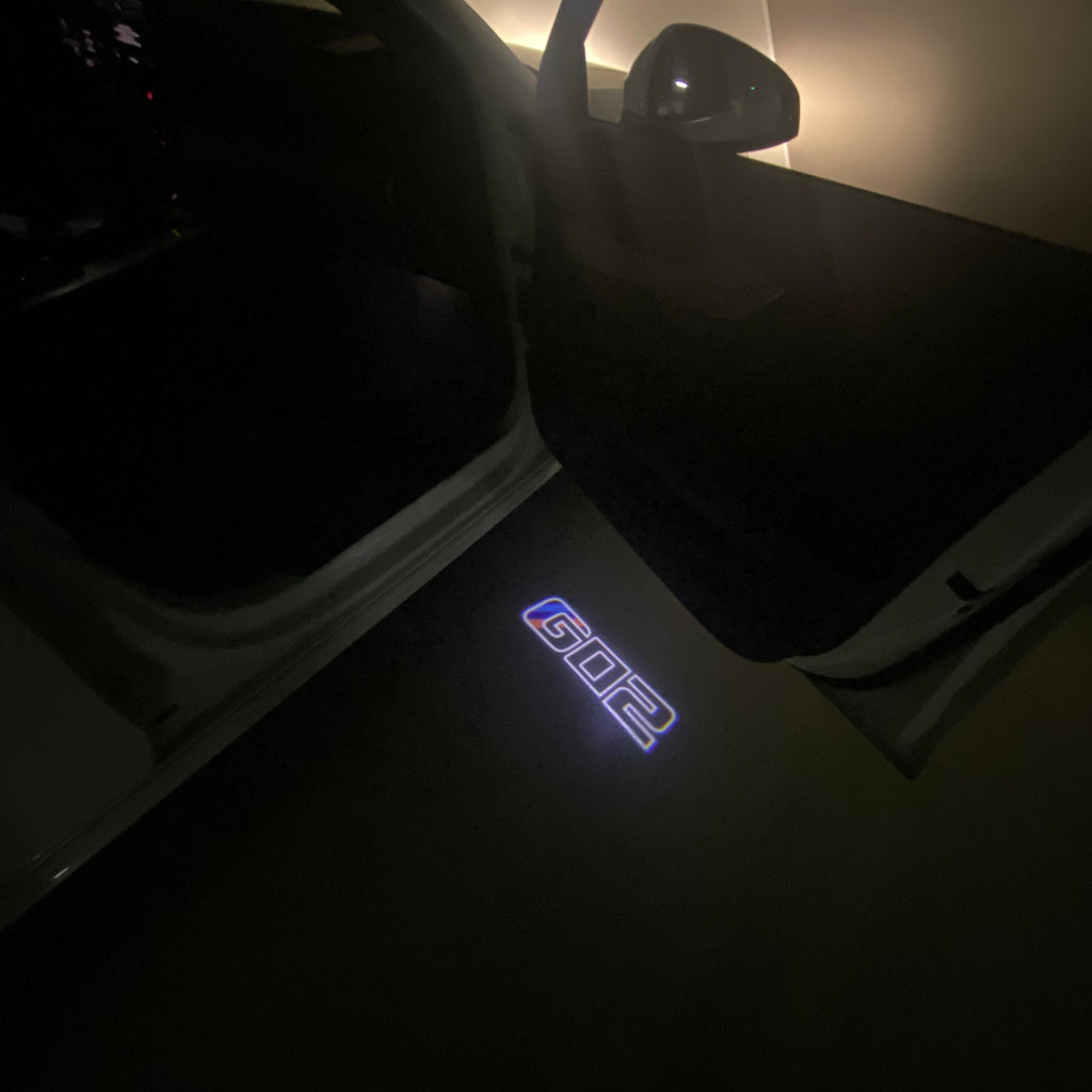 BMW X4 / X4M G02  LOGO PROJECTOT LIGHTS (quantity 1 = 1 sets/2 door lights) Nr.6024q0t03B6