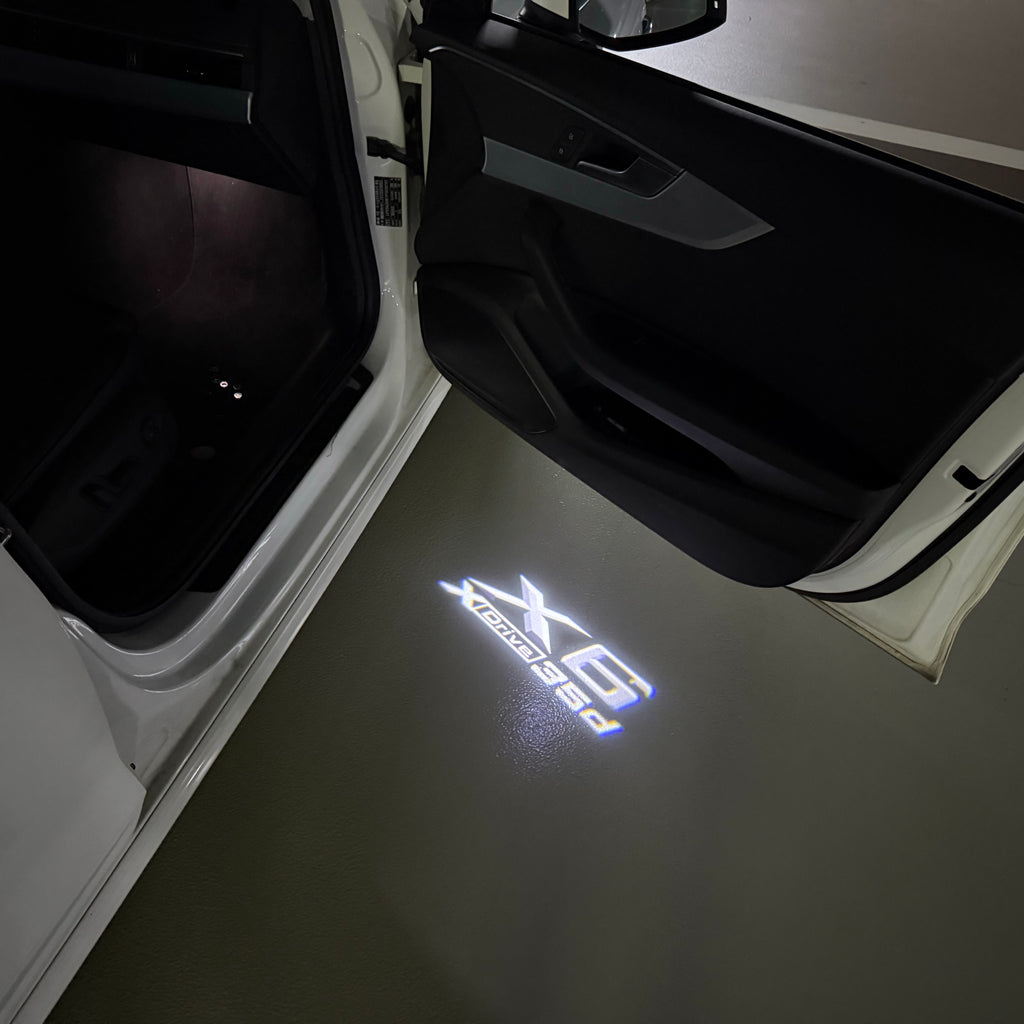 BMW  X6 Xdrive LOGO PROJECTOT LIGHTS (quantity 1 = 1 sets/2 door lights) Nr.6024q0t0104