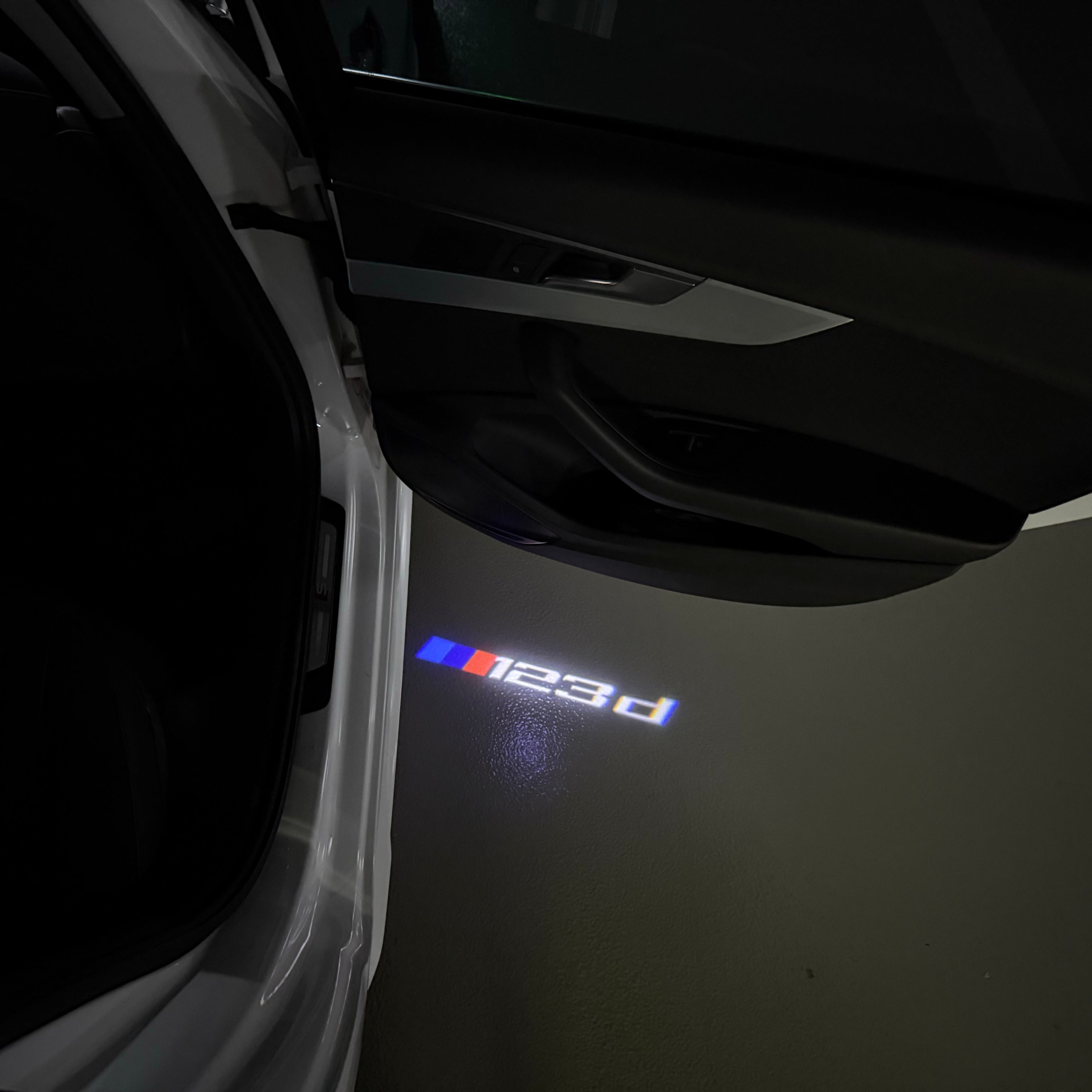 BMW 1 SERIES  123  LOGO PROJECTOT LIGHTS (quantity 1 = 1 sets/2 door lights) Nr.6024q16