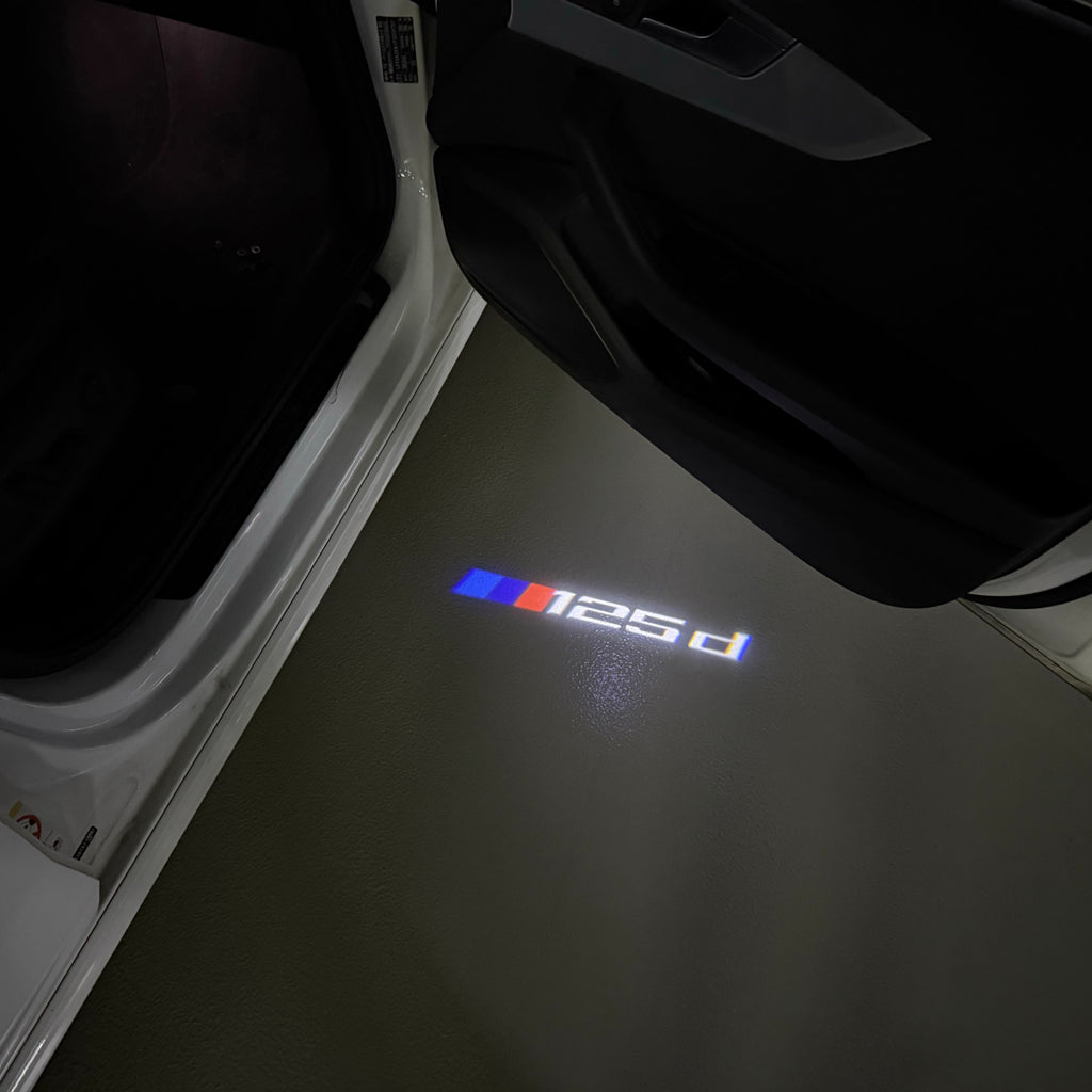 BMW  1 SERIES  125  LOGO PROJECTOT LIGHTS (quantity 1 = 1 sets/2 door lights) Nr.6024t18