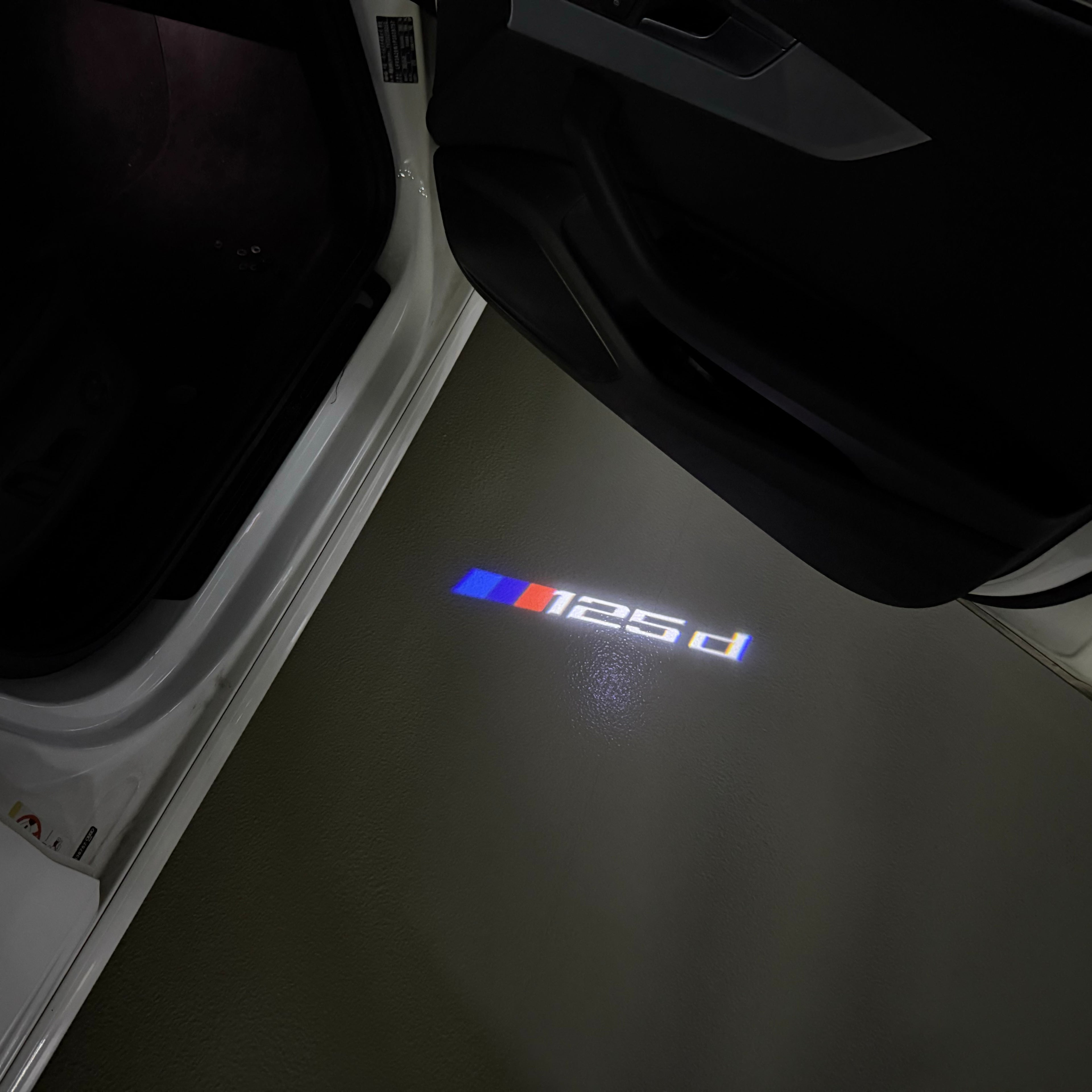 BMW  1 SERIES  125  LOGO PROJECTOT LIGHTS (quantity 1 = 1 sets/2 door lights) Nr.6024t18