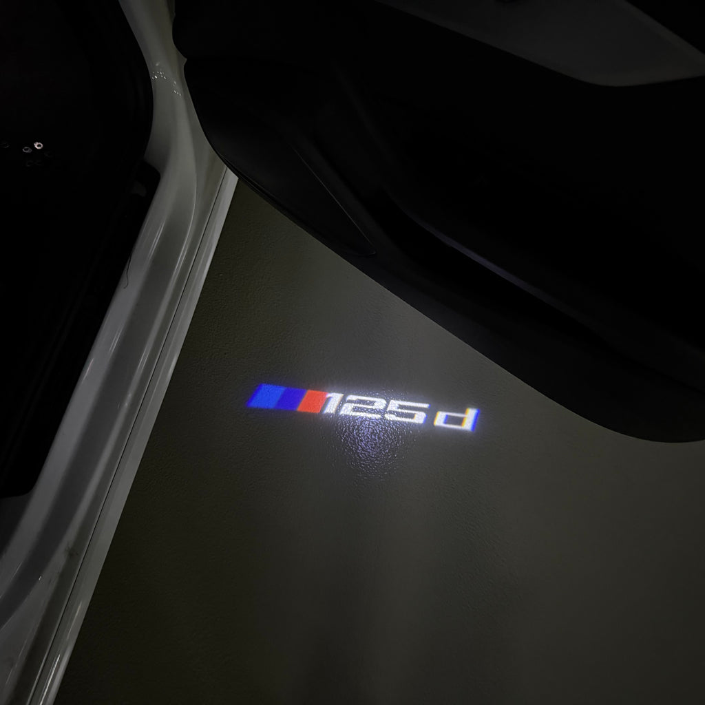 BMW  1 SERIES  125  LOGO PROJECTOT LIGHTS (quantity 1 = 1 sets/2 door lights) Nr.6024t18